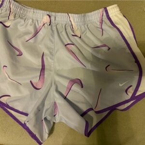 Nike Girl’s Light Purple Shorts with Purple Swoosh Print